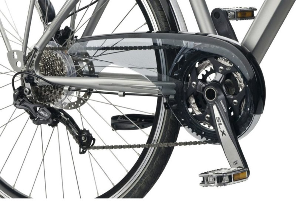 Велосипед с цепью на переднем колесе. Защита цепи для велосипеда. Кожух цепи велосипеда. Натяжитель цепи велосипеда. Защита штанов от цепи велосипеда.