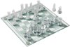 Afbeelding van het spelletje Schaakspel met glazen schaakstukken + boek schaken veel meer dan zwart en wit